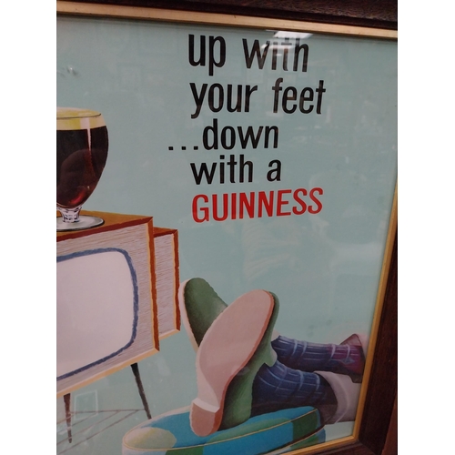 127 - Up with your feet�Down with a Guinness framed advertising print {58cm H x 46cm W}.