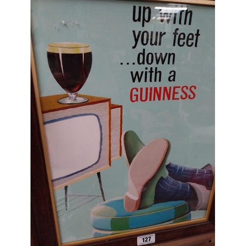 127 - Up with your feet�Down with a Guinness framed advertising print {58cm H x 46cm W}.