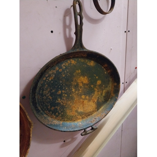 1296 - Three large 20th C. metal frying pans. Largest {70 cm H x 14 cm W}