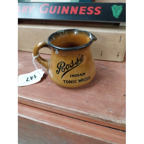 147 - Ross's Ginger Ale Belfast ceramic advertising water jug. {8 cm H x 10 cm W x 12 cm D}.