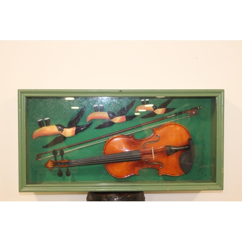 162 - Three Guinness Toucans and a Violin glazed showcase {37 cm H x 75 cm W x 16 cm D}.