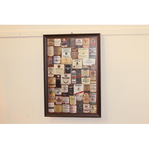 169 - Irish Whiskey advertising collage print in wooden frame. { 82 cm H x 57 cm W}.