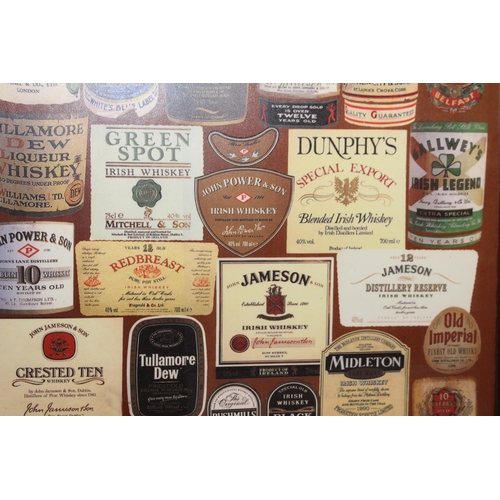 169 - Irish Whiskey advertising collage print in wooden frame. { 82 cm H x 57 cm W}.