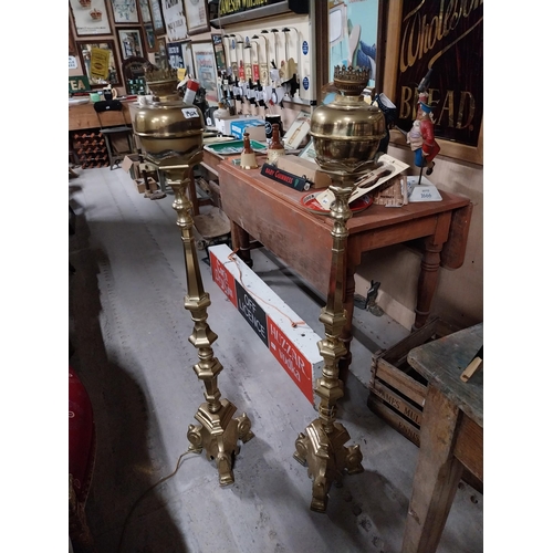 190A - Pair of 19th C. brass standard oil lamps with ruby tulip glass shades {140 cm H x 21 cm Dia.}.