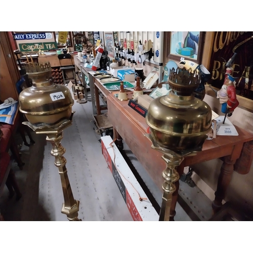 190A - Pair of 19th C. brass standard oil lamps with ruby tulip glass shades {140 cm H x 21 cm Dia.}.