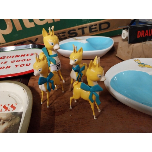21 - Set of four Babycham advertising figures {13cm H to 16cm H}.
