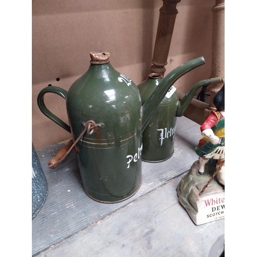 229 - Two Petroleum green enamel cans - 2Ltr. And 1L. {26cm H & 20cm H}.