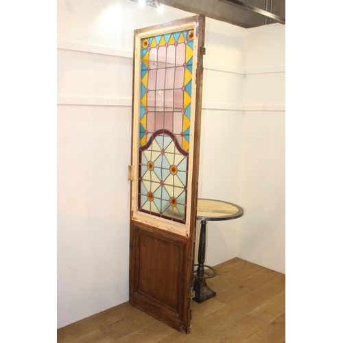 232 - Stain glass bar divider with bull's eye design. { 210 cm H x 64 cm W x 4 cm D}.