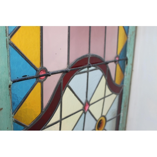 232 - Stain glass bar divider with bull's eye design. { 210 cm H x 64 cm W x 4 cm D}.