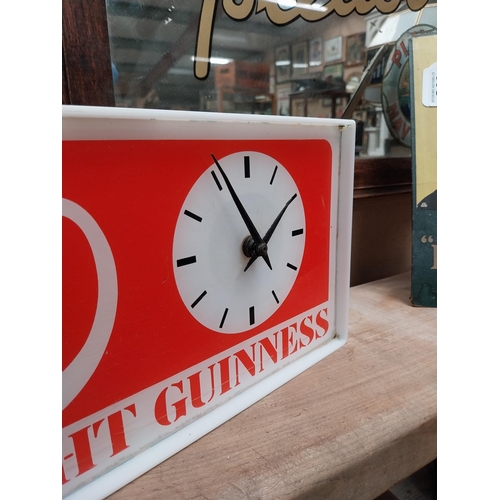 240 - Draught Guinness Perspex advertising clock {18cm H x 36cm W x 8cm D}.