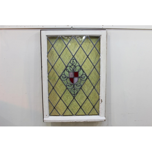 241 - Stain glass leaded window with brass handle. { 89 cm H x 59 cm W x 5 cm D}.