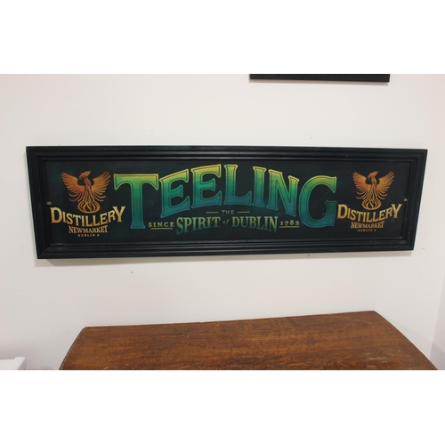 243 - Teeling Whisky framed advertising sign {34 cm H x 122 cm W}.