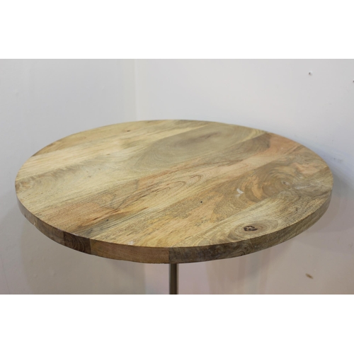 259 - Round wooden topped bar table with adjustable aluminium base. { 107 cm H x 70 cm Diam}.