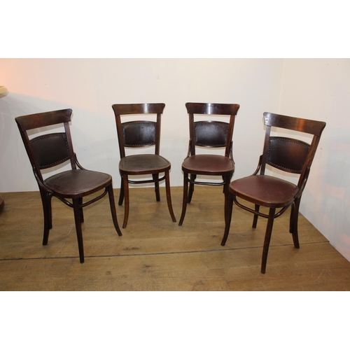 277 - Set of four bentwood chairs with leather seat and back. {90 cm H x 40 cm W x 40 cm D}.