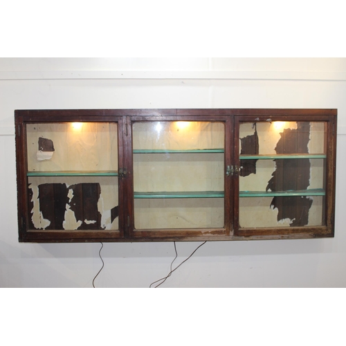 295 - 19th C. mahogany display cabinet with three glazed doors. { 80 cm H x 196 cm W x 15 cm D}.