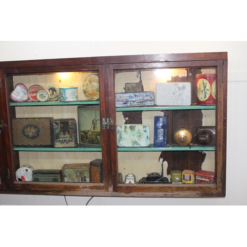 295 - 19th C. mahogany display cabinet with three glazed doors. { 80 cm H x 196 cm W x 15 cm D}.