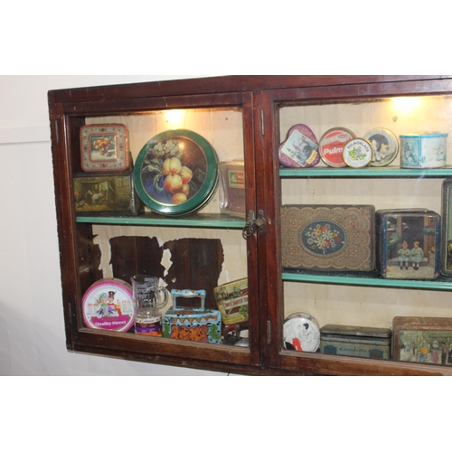 295 - 19th C. mahogany display cabinet with three glazed doors. { 80 cm H x 196 cm W x 15 cm D}.