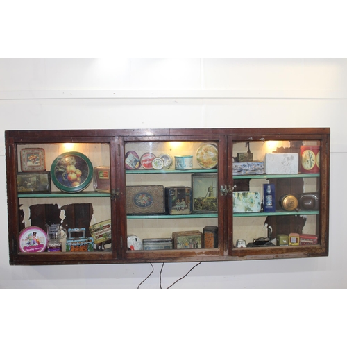 295 - 19th C. mahogany display cabinet with three glazed doors. { 80 cm H x 196 cm W x 15 cm D}.