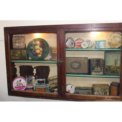 295 - 19th C. mahogany display cabinet with three glazed doors. { 80 cm H x 196 cm W x 15 cm D}.