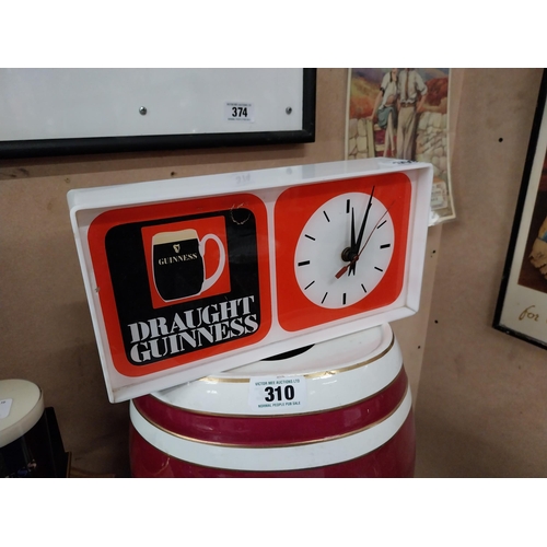 309 - Draught Guinness Perspex advertising clock {15 cm H x 30cm W x 6 cm D}.