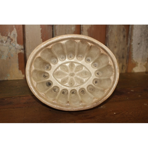 322 - Ceramic Jelly Mould. {10 cm H x 20 cm W x 7 cm D}.