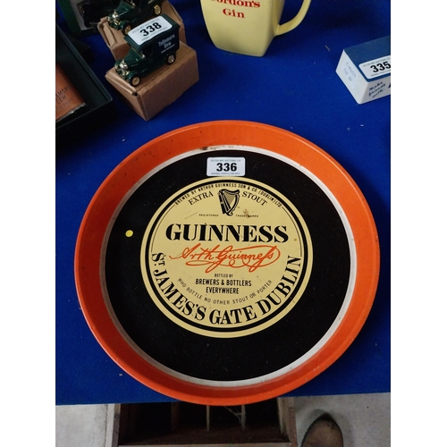 336 - Guinness St James Gate Dublin tinplate advertising drinks tray. {30 cm Diam}.