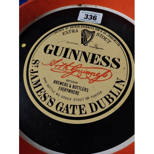 336 - Guinness St James Gate Dublin tinplate advertising drinks tray. {30 cm Diam}.