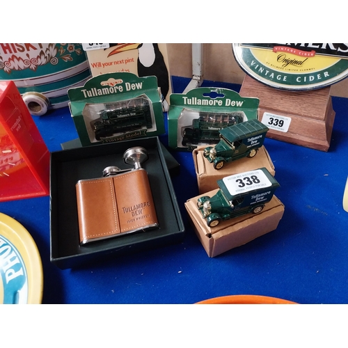 338 - Collection of Tullamore Dew memorabilia - Two Oxford Diecast models delivery vans, cased leather and... 