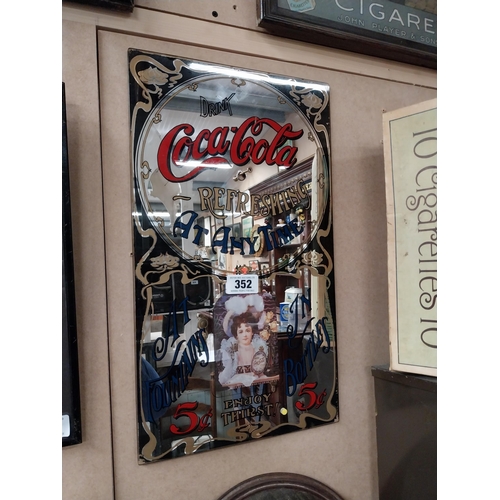 352 - Coca Cola advertising mirror. {50 cm H x 29 cm W}.