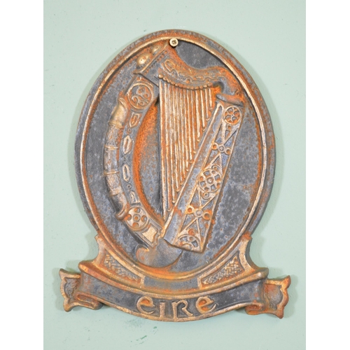 359 - Metal wall Eire  plaque {28 cm H x 22 cm W}.