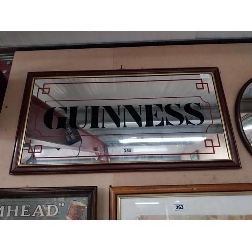 364 - Guinness Advertising mirror in wooden frame. {43 cm H x 82 cm W}.