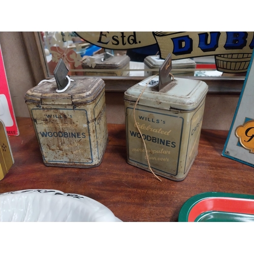 388 - Pair of Capstan advertising string tins. {17 cm H x 10 cm W x 10 cm D}.