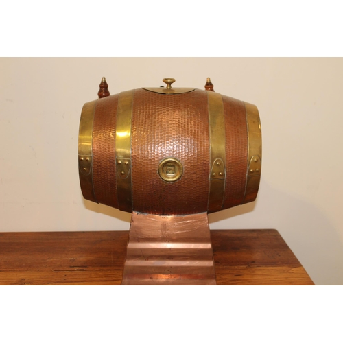 412 - Three optic set in from of copper and brass barrel. { 48 cm H x 40 cm W x 40 cm D}.