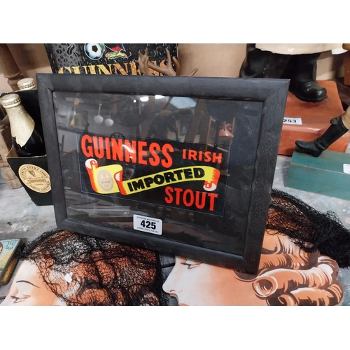 425 - Guinness Irish Imported Stout framed advertising show card. {  25 cm H X  33 cm W }.