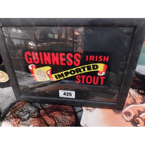 425 - Guinness Irish Imported Stout framed advertising show card. {  25 cm H X  33 cm W }.