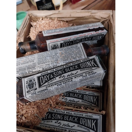 68 - Set of six Day & Son's black drink bottles in original wooden box.