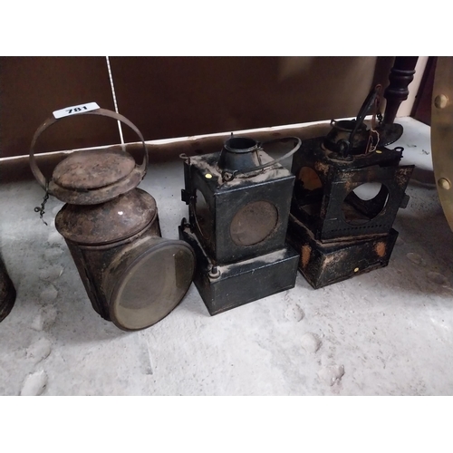 781 - Three early 20th C. metal railway lanterns {30 cm H x 23 cm H}.