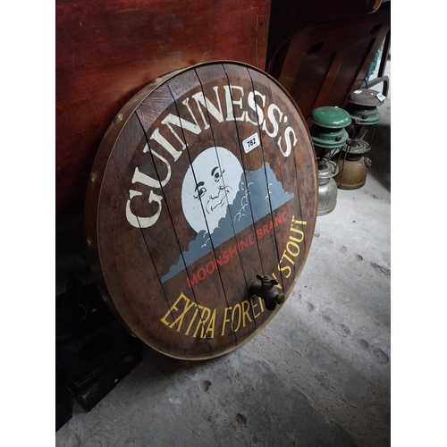 782 - Guinness Moonshine Extra Foreign Stout  wooden advertising barrel end {61 cm  Dia.}.