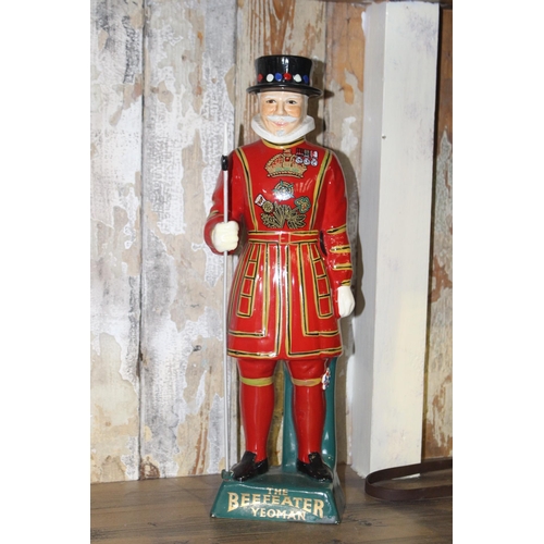 79 - Beefeater Gin Yoeman ceramic advertising figure. {41 cm H x 14 cm W x 10 cm D}.