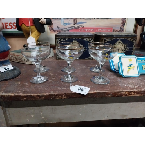 86 - Set of five Babycham advertising glasses (not in box) and another {11cm H x 9cm Dia.}.