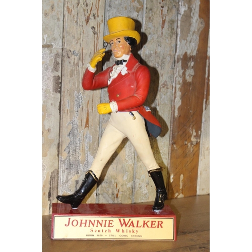 89 - Johnny Walker Ruberoid advertising figure. {41 cm H x 23 cm W x 14 cm D}.