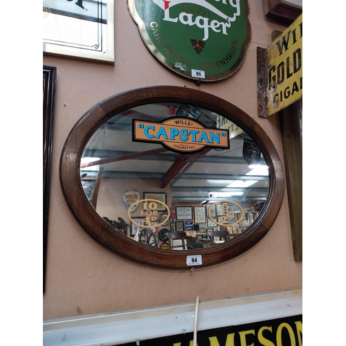 94 - Framed oval mirror later Will's Gold flake advertising design {53cm H x 70cm W}.