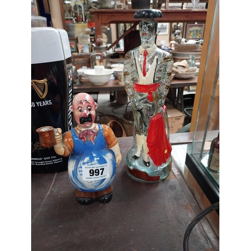 997 - Glass brandy bottle in the form of a Bull Fighter and ceramic figure of a bar man {31 cm H and 19 cm... 