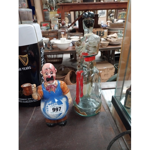 997 - Glass brandy bottle in the form of a Bull Fighter and ceramic figure of a bar man {31 cm H and 19 cm... 