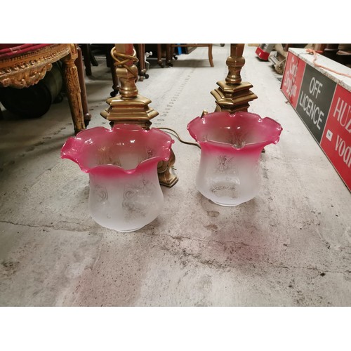 190A - Pair of 19th C. brass standard oil lamps with ruby tulip glass shades {140 cm H x 21 cm Dia.}.