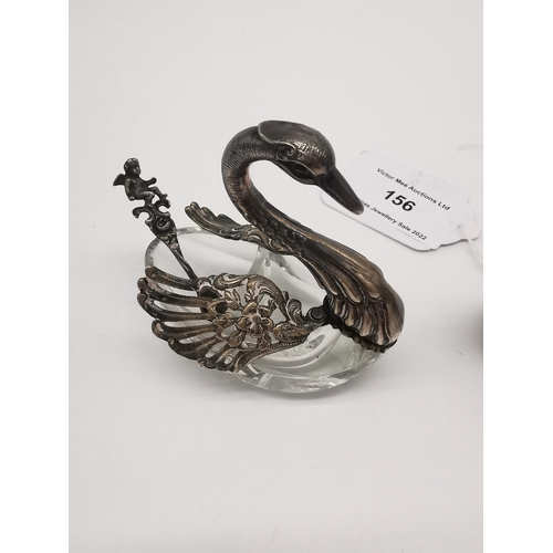 156A - Decorative pair of lead crystal and sterling silver salts in the form of swans with movable wings an... 