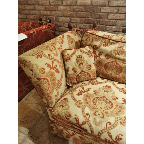 100 - Decorative cream and red upholstered two seater couch with cushions, with drop down sides  in the Du... 