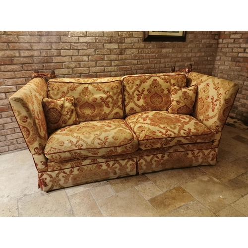101 - Decorative cream and red upholstered two seater couch with cushions, with drop down sides  in the Du... 