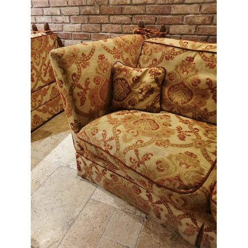 101 - Decorative cream and red upholstered two seater couch with cushions, with drop down sides  in the Du... 