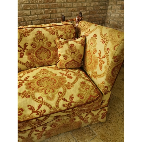 101 - Decorative cream and red upholstered two seater couch with cushions, with drop down sides  in the Du... 